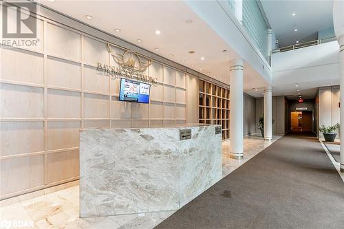 Welcome Area With Decorative Columns - 150 Dunlop Street E Unit# 711, Barrie, ON - Indoor Photo Showing Other Room