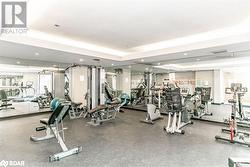 Workout Room Featuring A Textured/Raised Ceiling - 