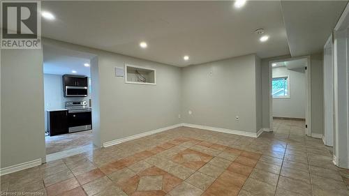 View of tiled empty room - 406 Erb Street W Unit# 2, Waterloo, ON - Indoor