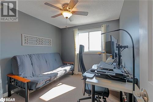 Home office with carpet flooring, a textured ceiling, and ceiling fan - 325 William Williams Street Unit# 31, Shelburne, ON - Indoor