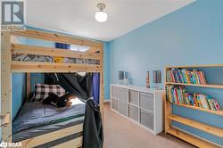 Carpeted bedroom with a textured ceiling - 