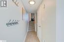 Hallway featuring a textured ceiling and light tile patterned floors - 325 William Williams Street Unit# 31, Shelburne, ON  - Indoor Photo Showing Other Room 