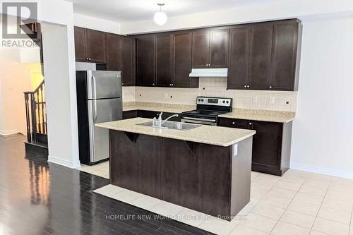 90 Rougeview Park Crescent, Markham, ON - Indoor Photo Showing Kitchen With Double Sink