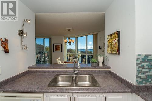 711 - 150 Dunlop Street E, Barrie, ON - Indoor Photo Showing Kitchen With Double Sink