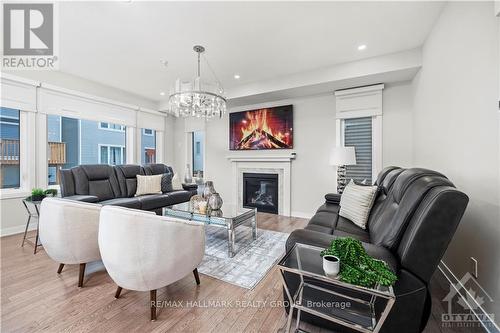 1828 Haiku Street, Ottawa, ON - Indoor Photo Showing Living Room With Fireplace