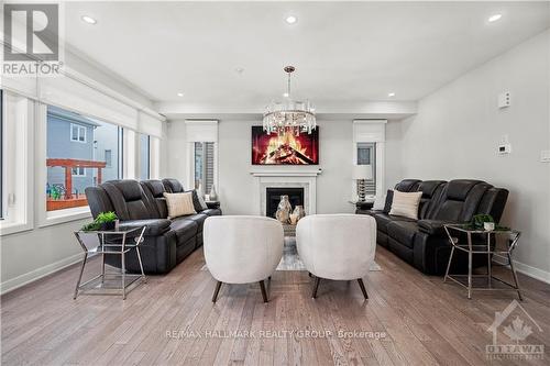 1828 Haiku Street, Ottawa, ON - Indoor Photo Showing Living Room With Fireplace