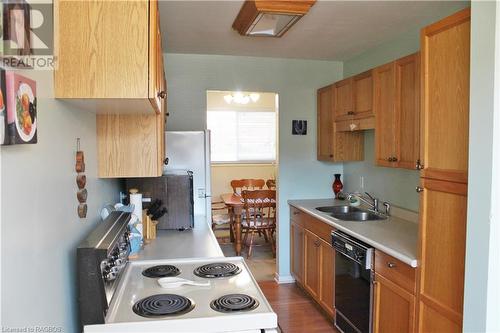 Galley kitchen - 48 Lamson Crescent Unit# 48, Owen Sound, ON - Indoor Photo Showing Kitchen With Double Sink