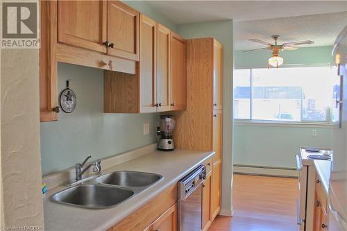 Galley kitchen - 48 Lamson Crescent Unit# 48, Owen Sound, ON - Indoor Photo Showing Kitchen With Double Sink