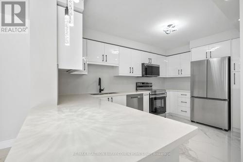 2405 - 10 Tangreen Court, Toronto, ON - Indoor Photo Showing Kitchen With Stainless Steel Kitchen