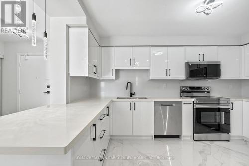 2405 - 10 Tangreen Court, Toronto, ON - Indoor Photo Showing Kitchen With Stainless Steel Kitchen