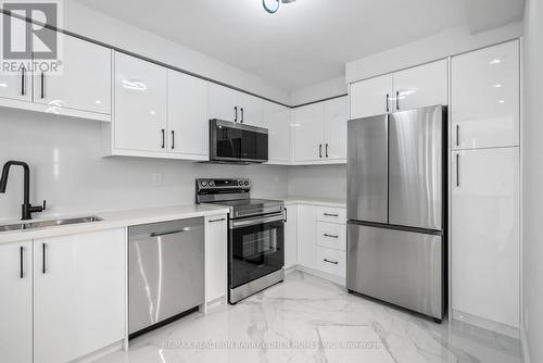 2405 - 10 Tangreen Court, Toronto, ON - Indoor Photo Showing Kitchen With Stainless Steel Kitchen