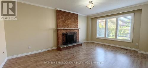 27 Carroll Street, Whitby, ON - Indoor With Fireplace