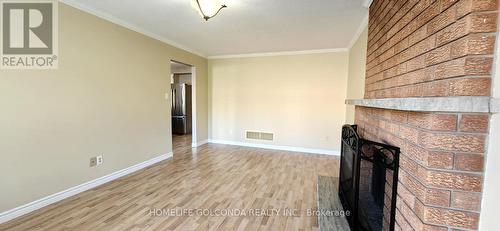 27 Carroll Street, Whitby, ON - Indoor Photo Showing Other Room With Fireplace