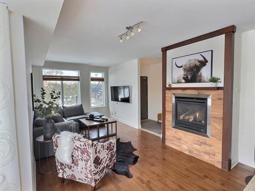 Salon - 3450 Rue Des Francs-Bourgeois, Boisbriand, QC - Indoor Photo Showing Living Room With Fireplace