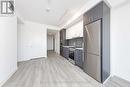 2411 - 50 Upper Mall Way, Vaughan, ON  - Indoor Photo Showing Kitchen 