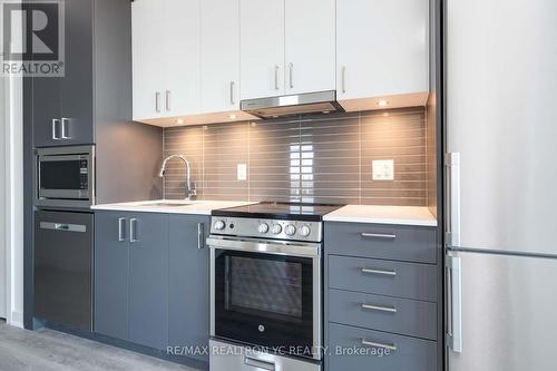 2411 - 50 Upper Mall Way, Vaughan, ON - Indoor Photo Showing Kitchen With Upgraded Kitchen