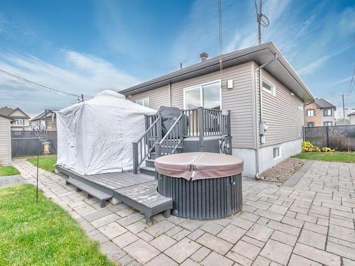 Face arriÃ¨re - 1293 Rue Jean-Moreau-Desjordy, Contrecoeur, QC - Outdoor With Deck Patio Veranda With Exterior