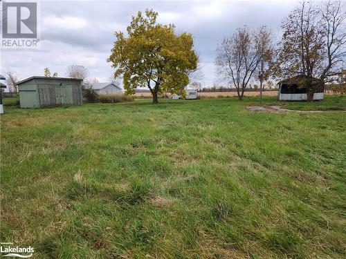 View of yard to the South East - 388 N Big Island Road, Prince Edward County, ON 