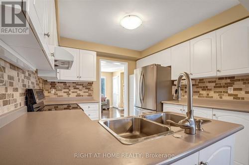 8 Trellanock Avenue, Toronto (Rouge), ON - Indoor Photo Showing Kitchen With Double Sink