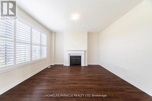 86 Whithorn Crescent, Haldimand, ON - Indoor Photo Showing Other Room With Fireplace