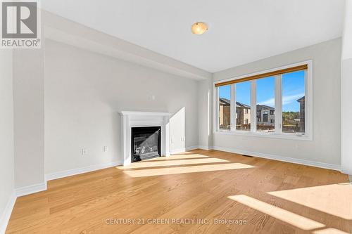 1174 Upper Thames Drive, Woodstock, ON - Indoor Photo Showing Living Room With Fireplace