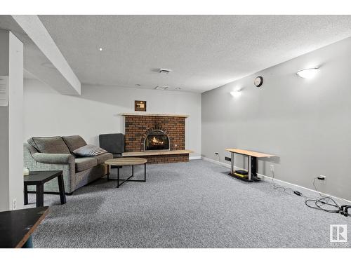 7912 44 Av Nw Nw, Edmonton, AB - Indoor With Fireplace