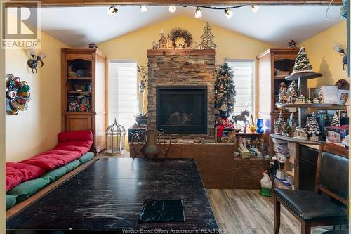 2211 Front Road, Lasalle, ON - Indoor Photo Showing Living Room With Fireplace