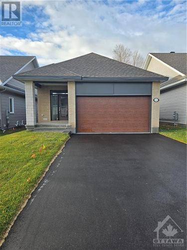 Tamarack "Carson" bungalow is ready for 30-60 possession.  Lovely 2 bedroom+ den , 2.5 single bungalow in sought after Adult lifestyle community in South Stittsville - 22 Kayenta Street, Ottawa, ON - Outdoor