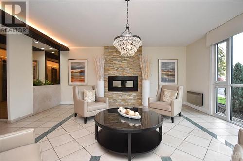 1025 Richmond Road Unit#1003, Ottawa, ON - Indoor Photo Showing Living Room With Fireplace