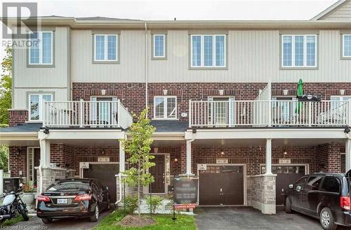 View of front of property featuring a balcony - 88 Decorso Drive Unit# 44, Guelph, ON - Outdoor With Balcony With Facade