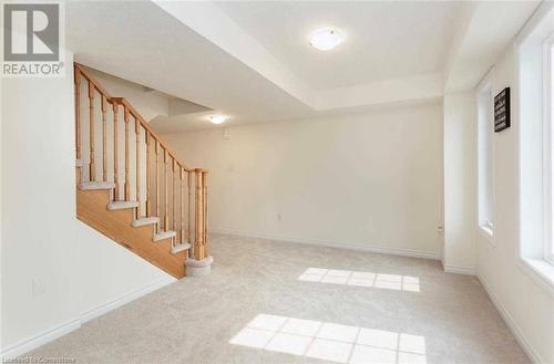 Basement with light colored carpet - 88 Decorso Drive Unit# 44, Guelph, ON - Indoor Photo Showing Other Room