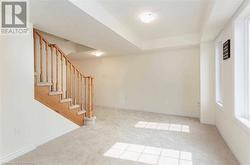 Basement with light colored carpet - 