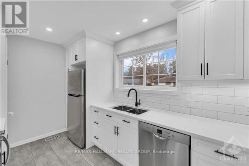 13 Oak Crescent, Brockville (810 - Brockville), ON - Indoor Photo Showing Kitchen With Double Sink