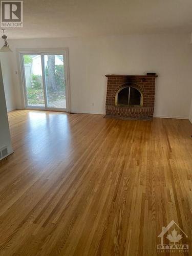 7 Westpark Drive, Ottawa, ON - Indoor Photo Showing Living Room With Fireplace