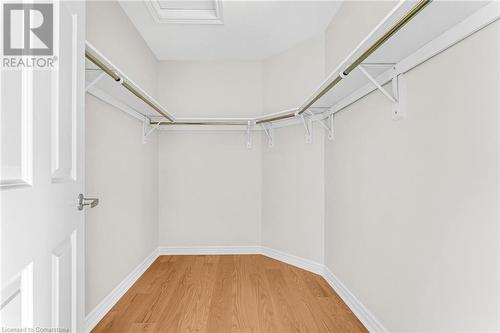 Spacious closet featuring hardwood / wood-style floors - 1174 Upper Thames Drive, Woodstock, ON - Indoor With Storage