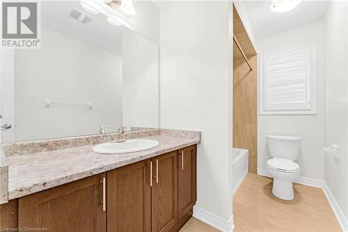 Full bathroom featuring tile patterned flooring, vanity, toilet, and shower / bath combination - 1174 Upper Thames Drive, Woodstock, ON - Indoor Photo Showing Bathroom