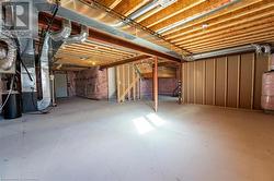 Basement featuring heating unit - 