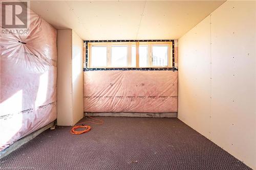 View of carpeted spare room - 1174 Upper Thames Drive, Woodstock, ON - Indoor