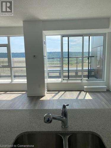 550 North Service Road Unit# 1001, Grimsby, ON - Indoor Photo Showing Kitchen With Double Sink