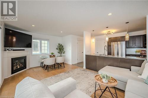 146 Downey Road Unit# 22B, Guelph, ON - Indoor Photo Showing Living Room With Fireplace