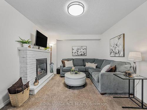 1 The Blvd, New Tecumseth, ON - Indoor Photo Showing Living Room With Fireplace