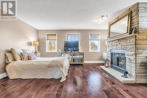 654 Ashprior Avenue, Mississauga, ON - Indoor Photo Showing Bedroom With Fireplace