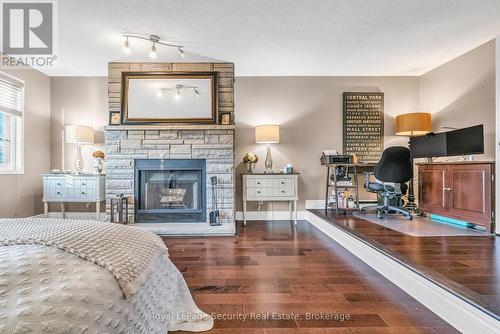 654 Ashprior Avenue, Mississauga, ON - Indoor Photo Showing Bedroom With Fireplace