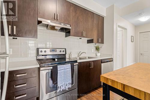 101 - 1 Beckenrose Court, Brampton, ON - Indoor Photo Showing Kitchen With Stainless Steel Kitchen With Double Sink