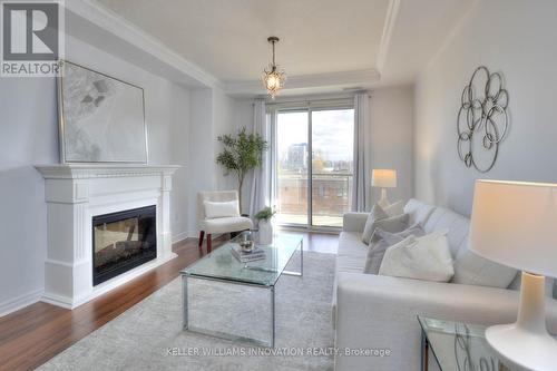 310 - 539 Belmont Avenue W, Kitchener, ON - Indoor Photo Showing Living Room With Fireplace