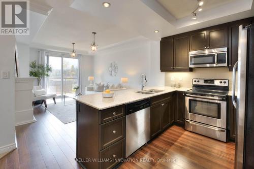 310 - 539 Belmont Avenue W, Kitchener, ON - Indoor Photo Showing Kitchen With Double Sink With Upgraded Kitchen