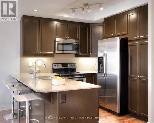 310 - 539 Belmont Avenue W, Kitchener, ON - Indoor Photo Showing Kitchen With Double Sink With Upgraded Kitchen