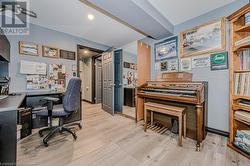 Office area featuring vinyl flooring. Potential 5th bedroom - 