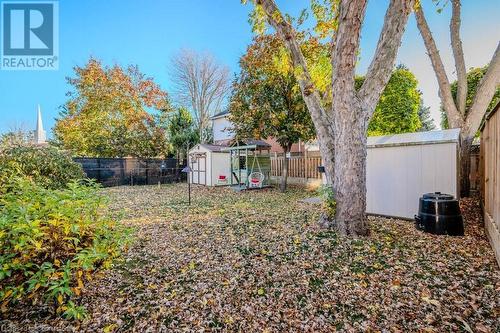 View of yard featuring a play structure and two  storage sheds - 2378 Headon Road, Burlington, ON - Outdoor