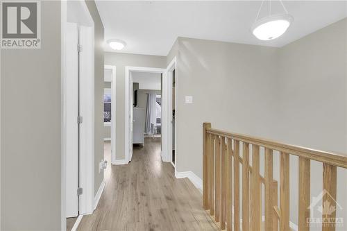 Upper level hallway...durable laminate flooring throughout this level as well. No worries with having pets! - 368 Horseshoe Crescent, Stittsville, ON - Indoor Photo Showing Other Room